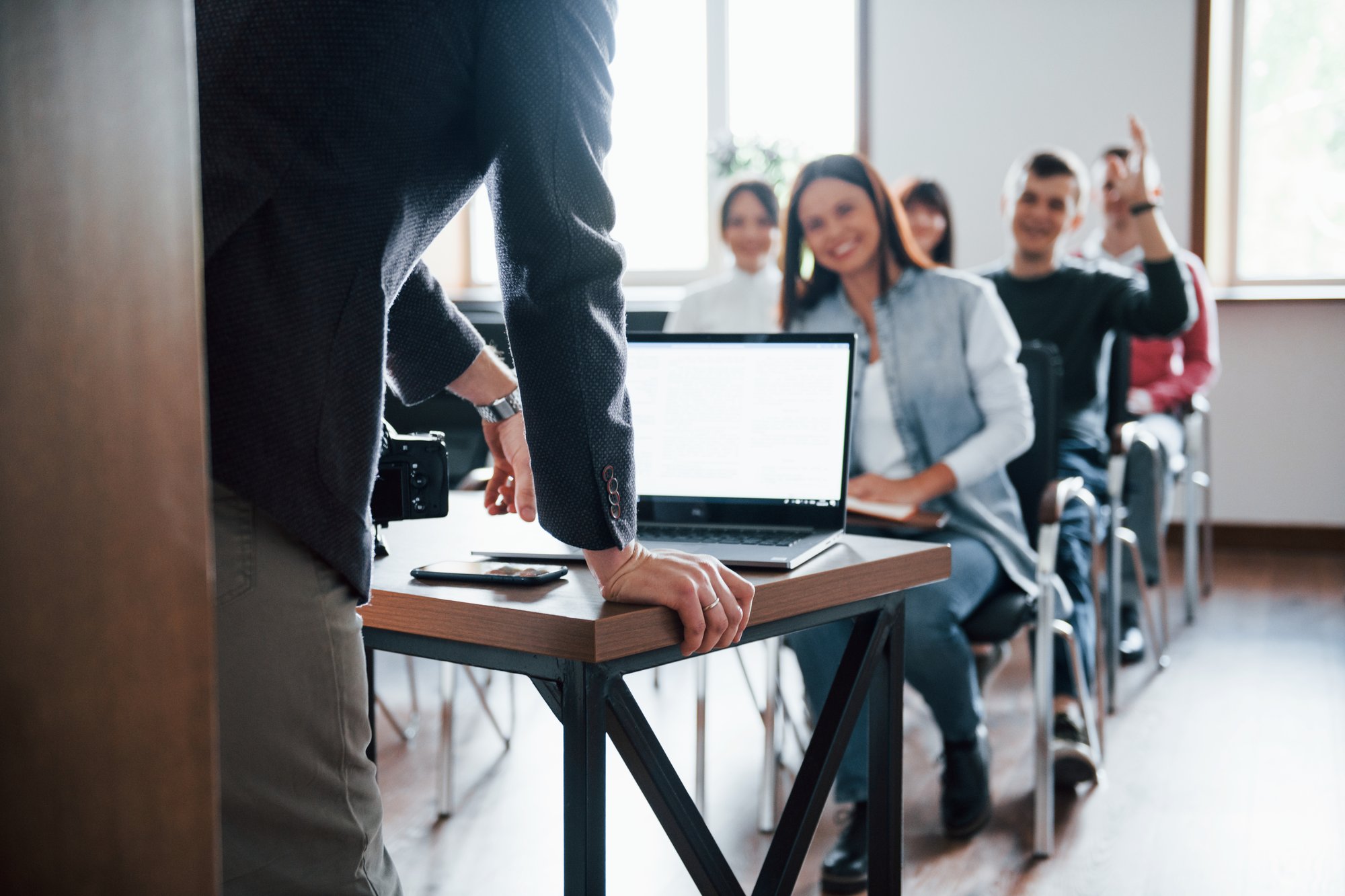 man-have-question-hand-raised-up-group-people-business-conference-modern-classroom-daytime